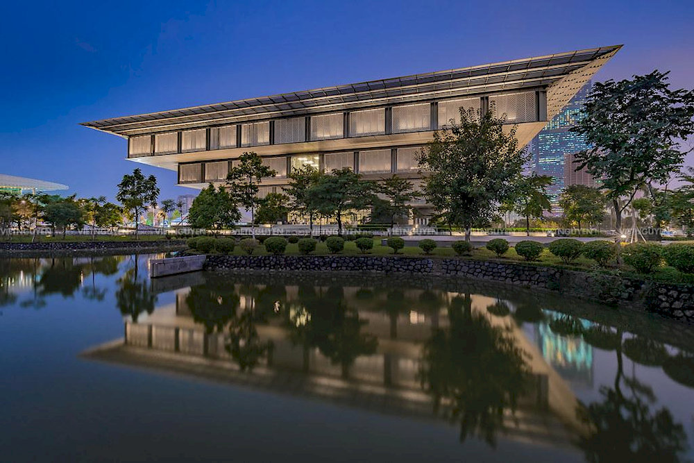 Hanoi Museum stands as a striking architectural masterpiece, shaped like an inverted pyramid